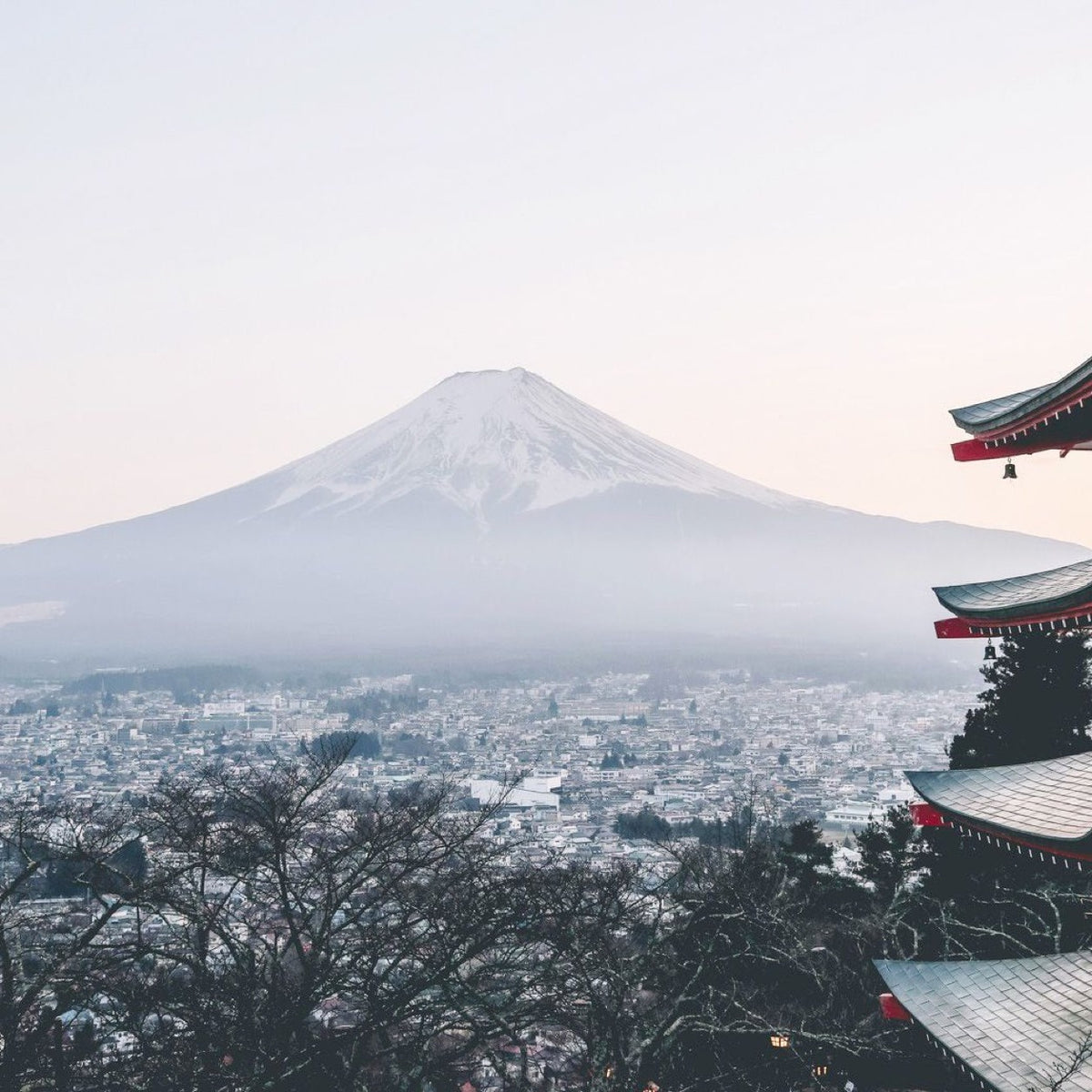 Mount Fuji beside a traditional pagoda in Japan.